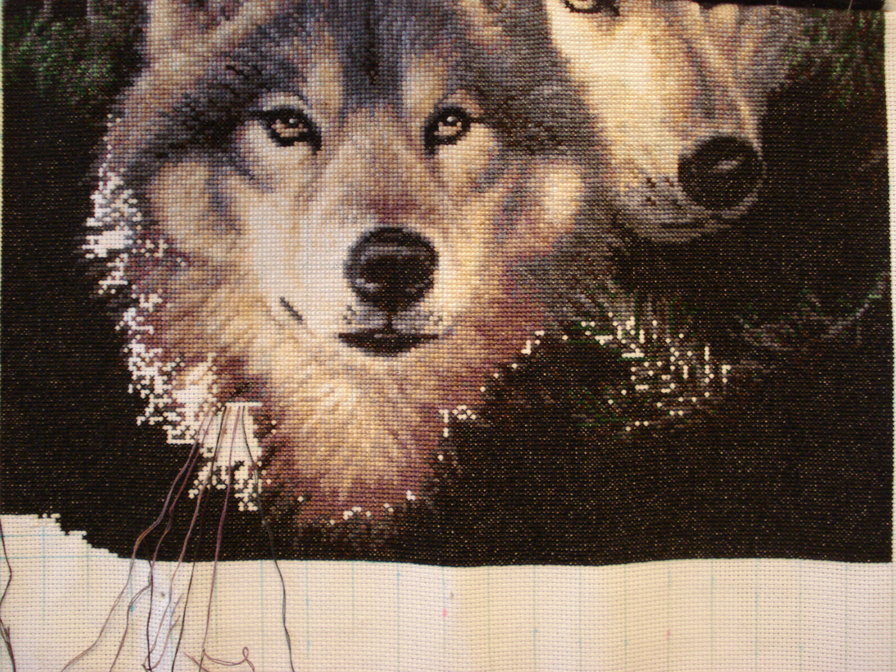 Разнообразные схемы для вышивки волков