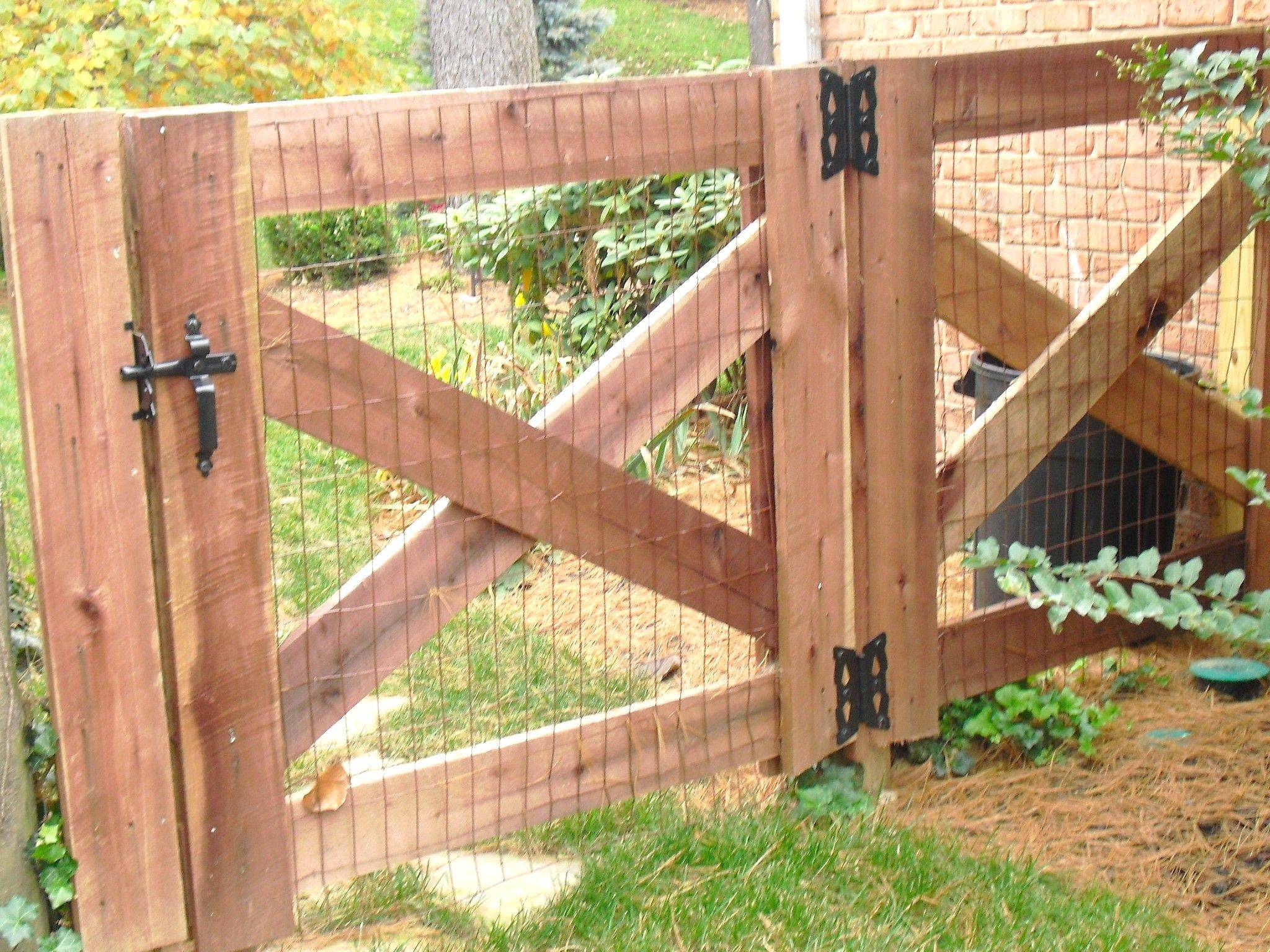 Как сделать и установить деревянные ворота своими руками